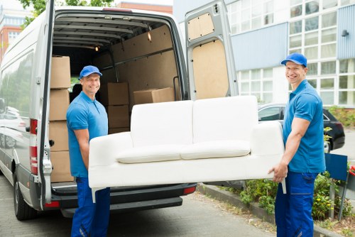 Professional man with van service handling household items in Tufnell Park