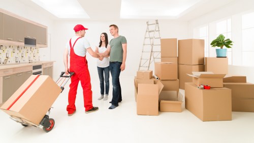 Packed boxes and furniture ready for a local house removal