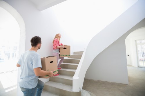 Boxes and office furniture being organised for a local relocation