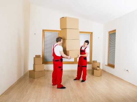 Local moving van loading outside a North London property